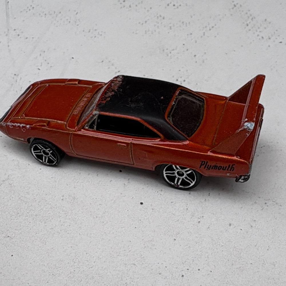 2005 pre-Owned Plymouth Rust and Black Toy Car